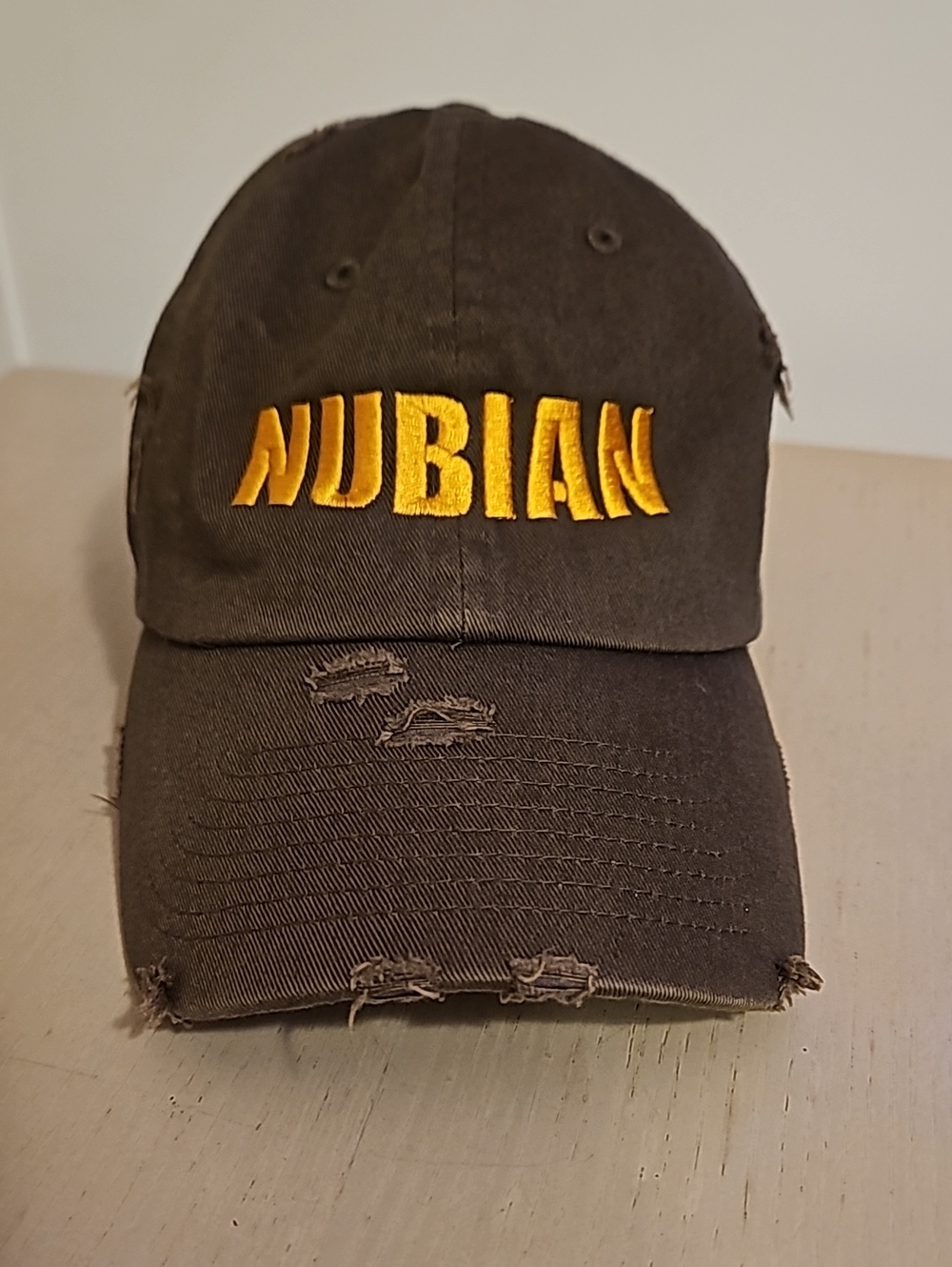 Unisex Nubian Embroidered Distressed Baseball Cap - Brown with Yellow Logo